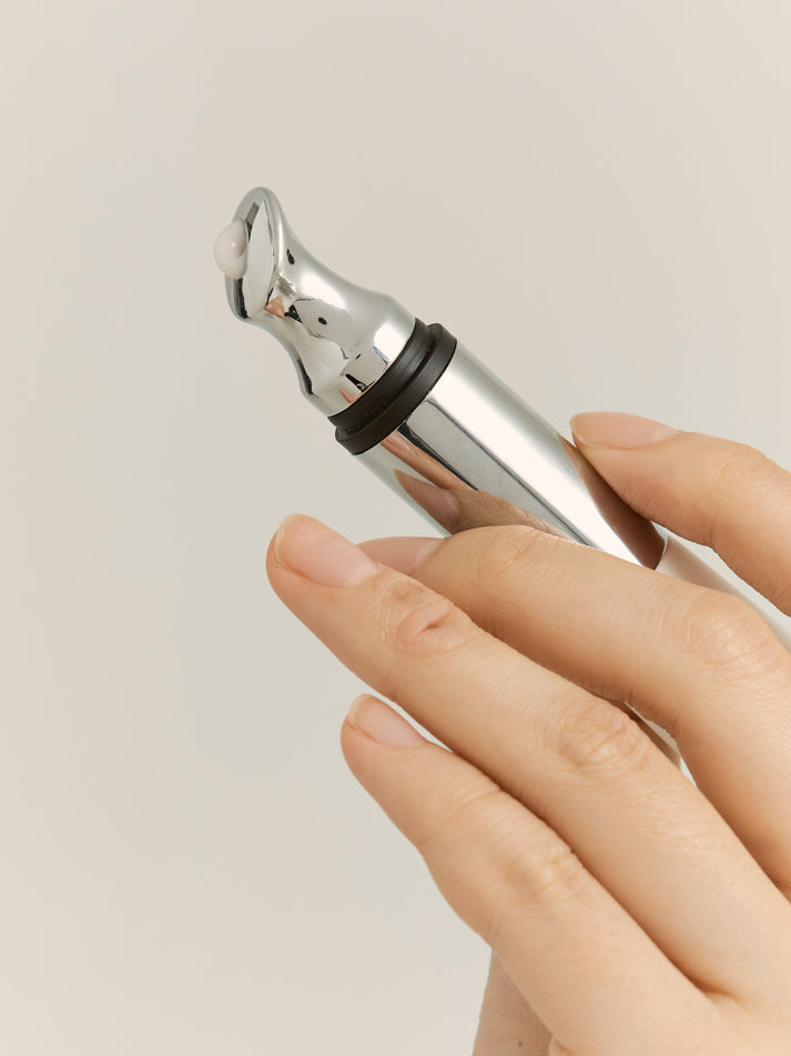 (Crema de ojos con vibrador) HEVEBLUE Black Yuja Bean Auto Eye Cream 15ml